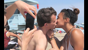 Ebony Girl Kisses White Boy On The Beach